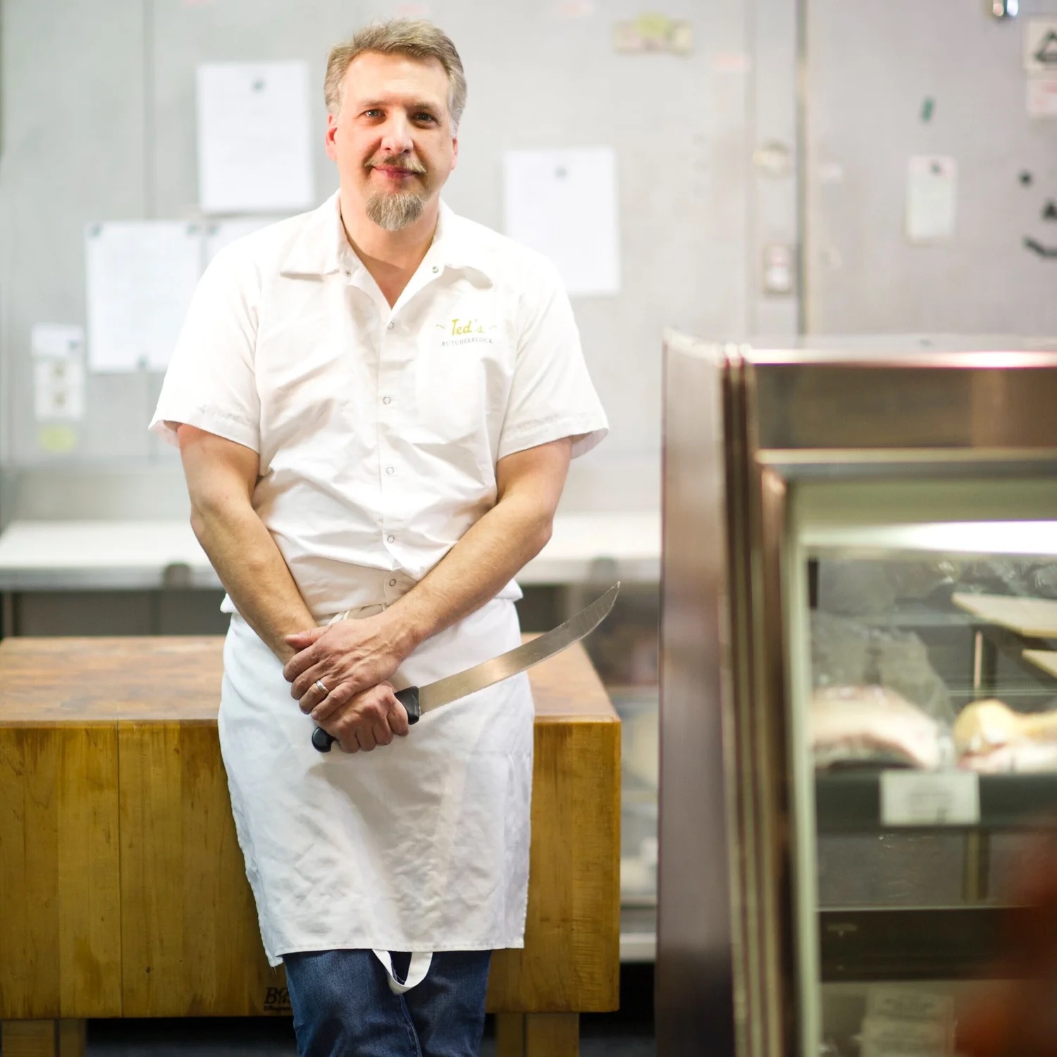 Ted Dombrowski, owner and butcher, at the butcher block